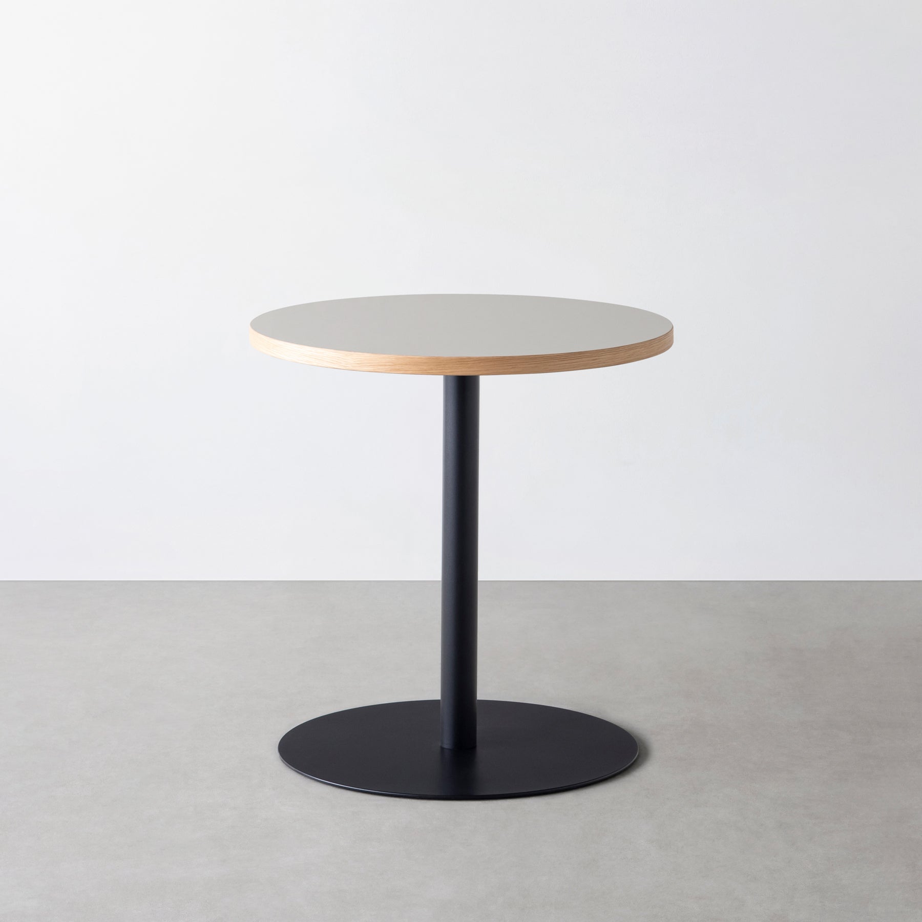 Kanademonoのリノリウムの1本脚のカフェテーブル