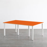 KANADEMONOのリノリウムOrange blast天板とマットホワイトのスクエアバー鉄脚を組み合わせたシンプルモダンな大型テーブル