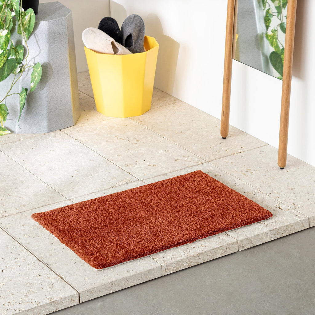 柔らかくふっくらとした厚みのあるハンドメイドラグ・玄関マットサイズ（テラコッタ使用例）