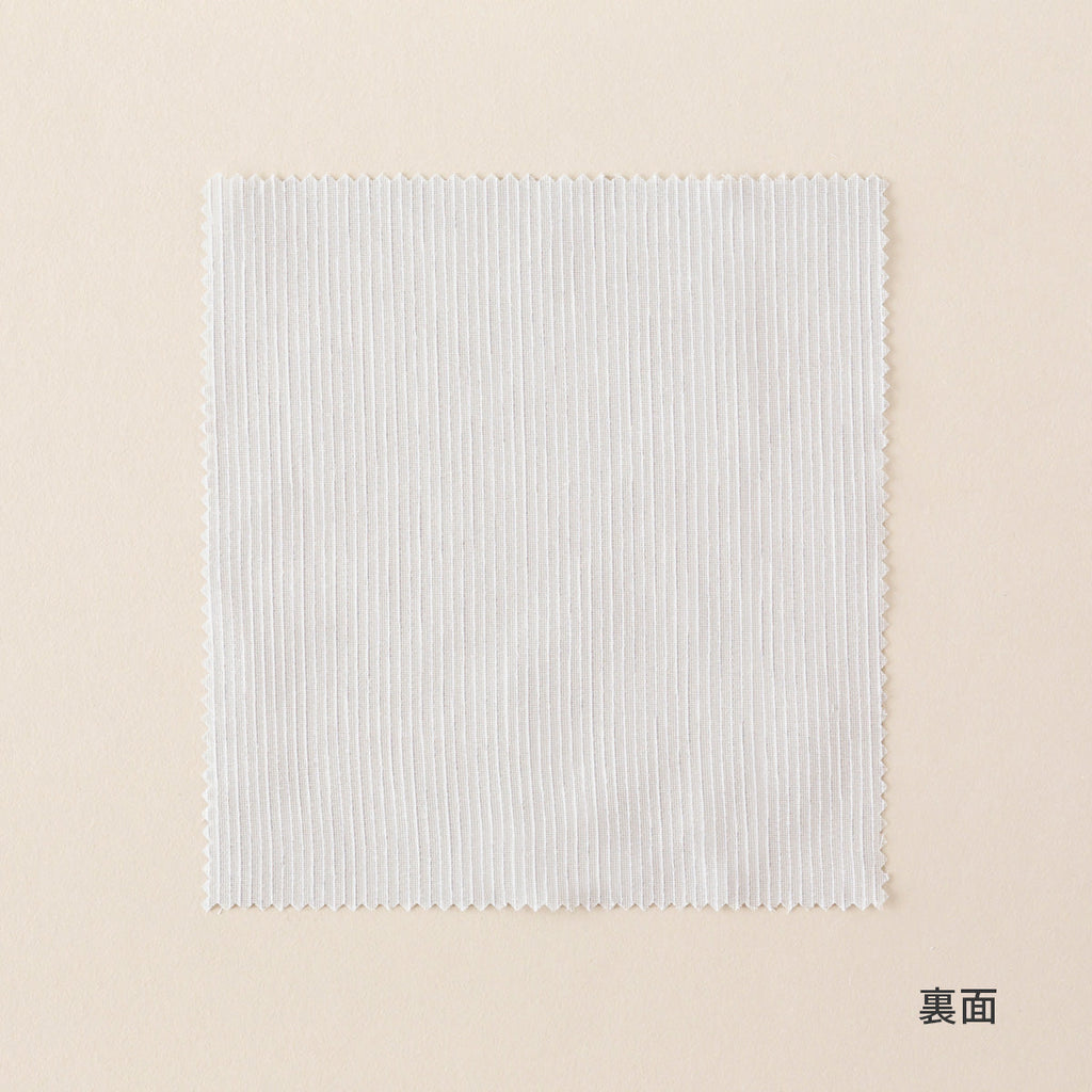 ライトグレーのカーテンカットサンプル（裏）