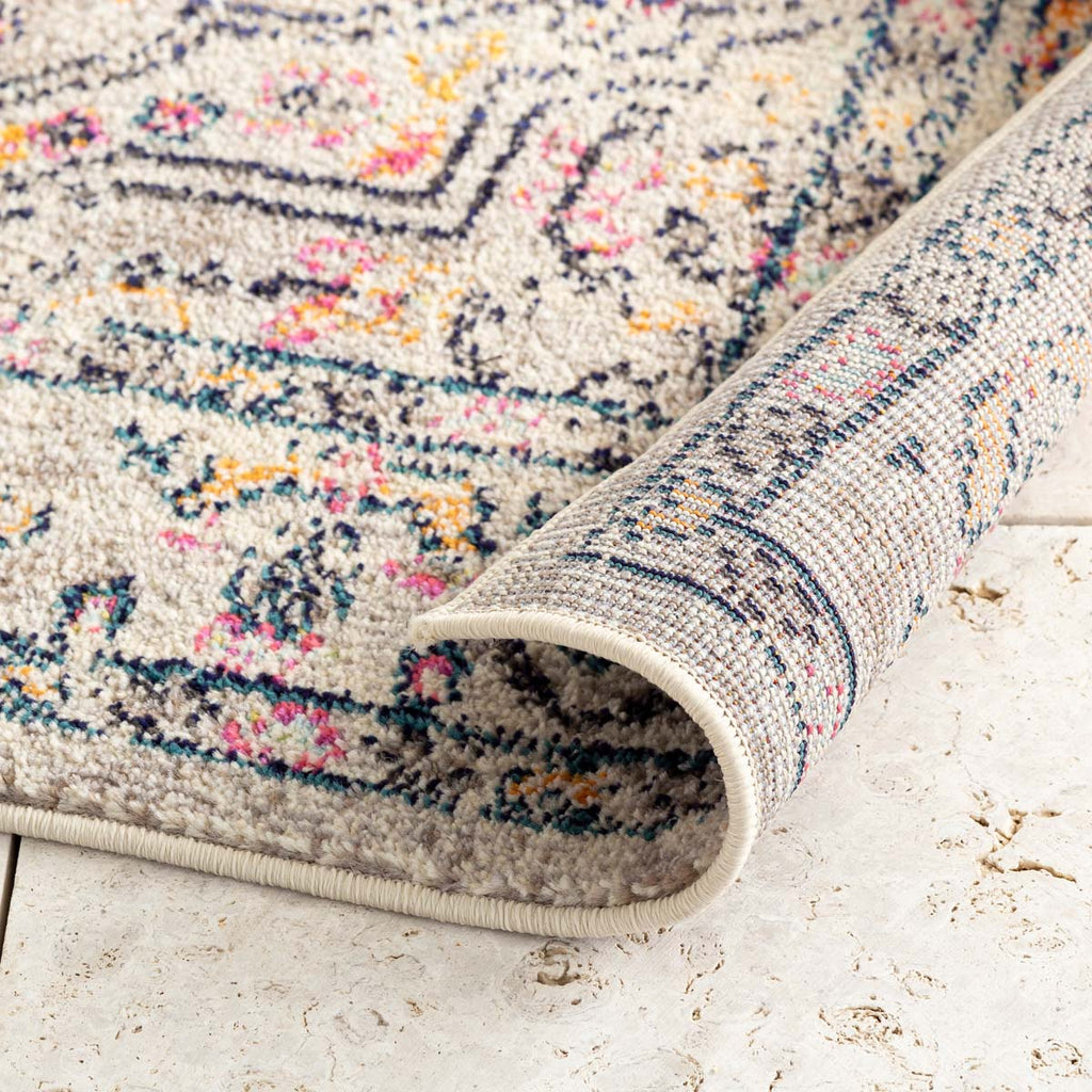 アイボリー・ベージュのグラデーションが優しい雰囲気のヴィンテージラグの裏地